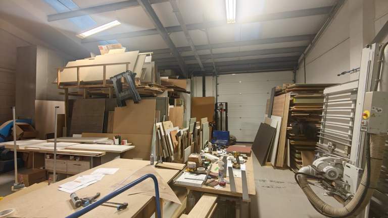 Vertical panel saw and loading area